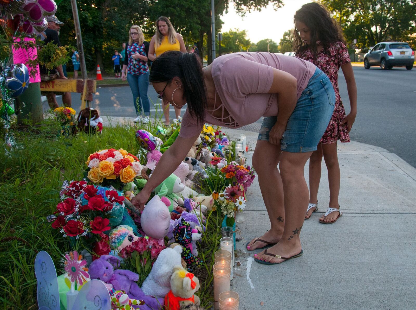 Vigil honors mother and daughter killed on Friday